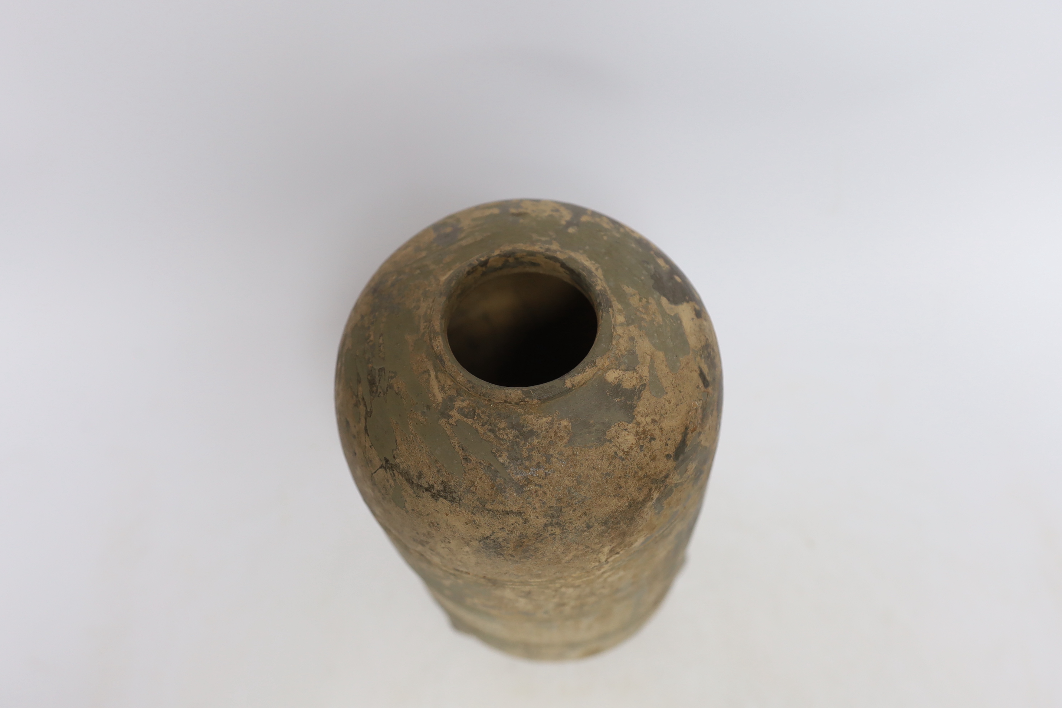 A Chinese grey pottery granary jar, Han dynasty, 22cm high